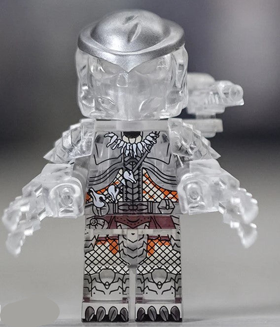 Predator LEGO minifigure with helmet, shoulder cannon, and wrist blades